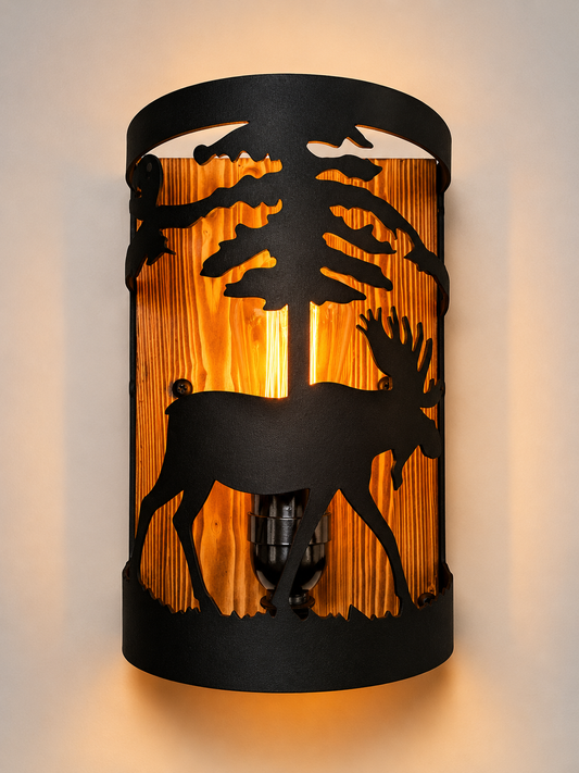 Handcrafted moose wall light with laser-cut steel wildlife design and solid wood back panel for cabins, lodges, and mountain homes.