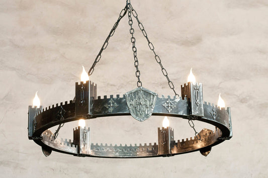 An iron chandelier with a medieval castle style, featuring a circular structure with six protruding towers, made of two layers of steel with a bare metal finish.