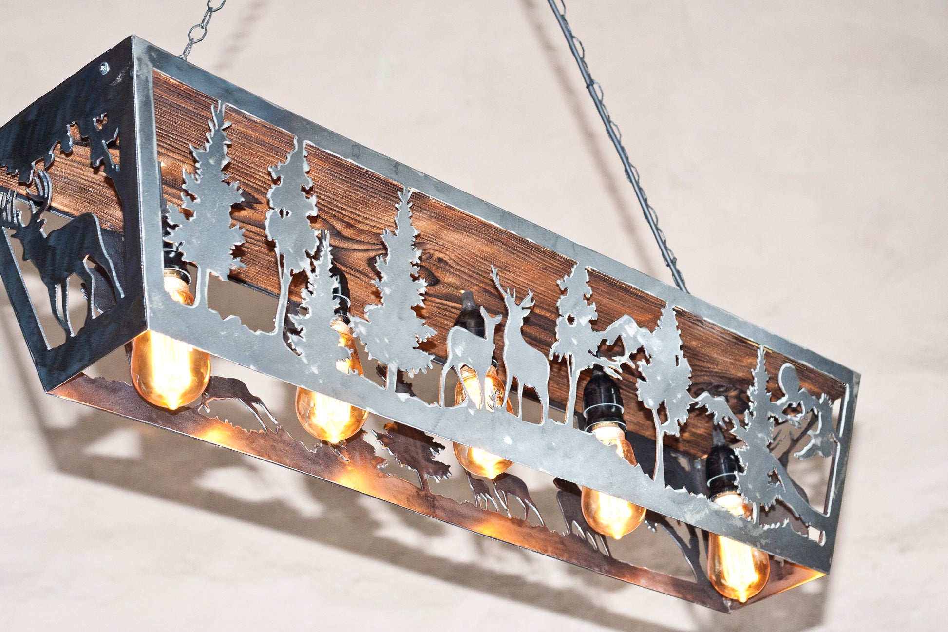 Rustic deer cabin ceiling light illuminated amber bulb