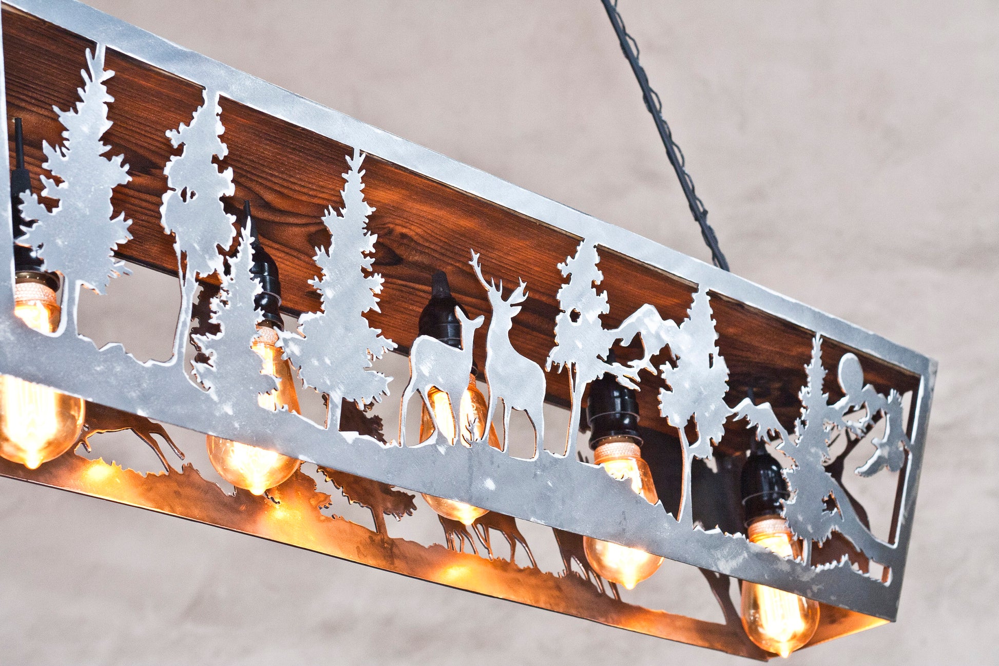 Handcrafted deer silhouette ceiling light close up