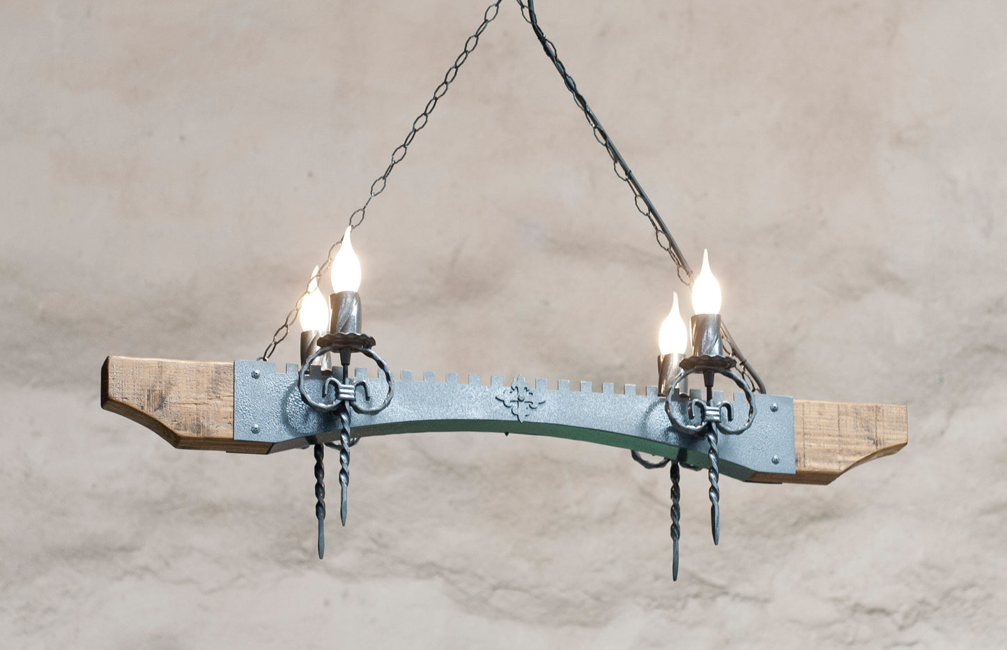 Chandelier lighting. Ceiling lights. Wrought iron chandelier. Four light wood and iron chandelier. Rustic ceiling lights.