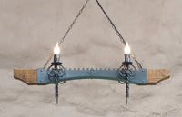 Chandelier lighting. Ceiling lights. Wrought iron chandelier. Four light wood and iron chandelier. Rustic ceiling lights.