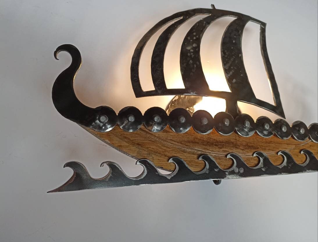 Hand hammered steel Viking ship silhouette wall sconce