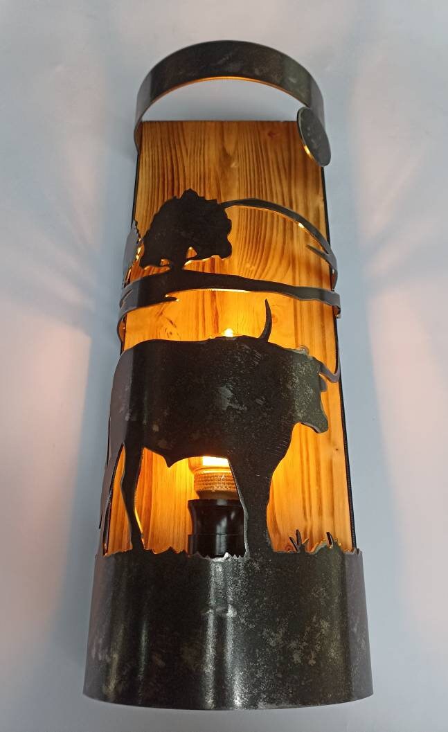 Handmade Western wall light with longhorn cutout, ranch house and lodge sconce