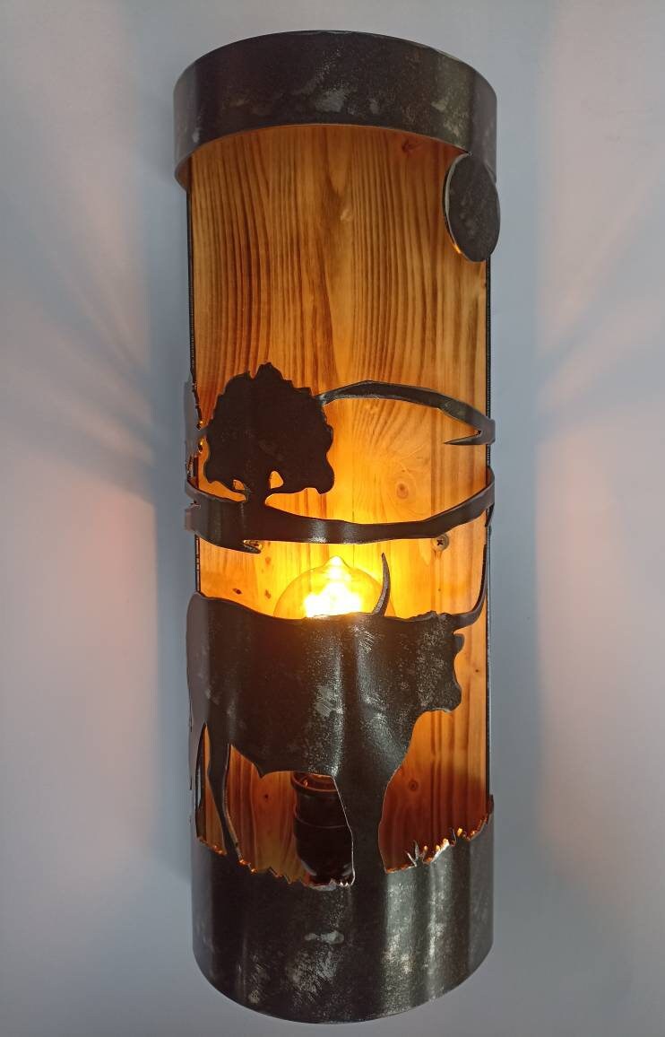 Texas-style longhorn wall sconce, handcrafted steel and wood lodge lighting