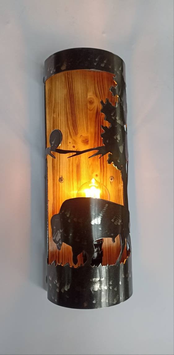 Handcrafted buffalo silhouette wall sconce close up