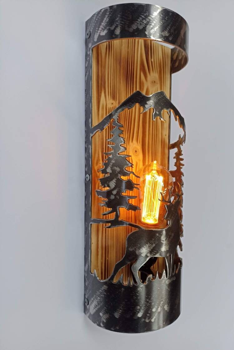 Whitetail deer lodge wall light illuminated