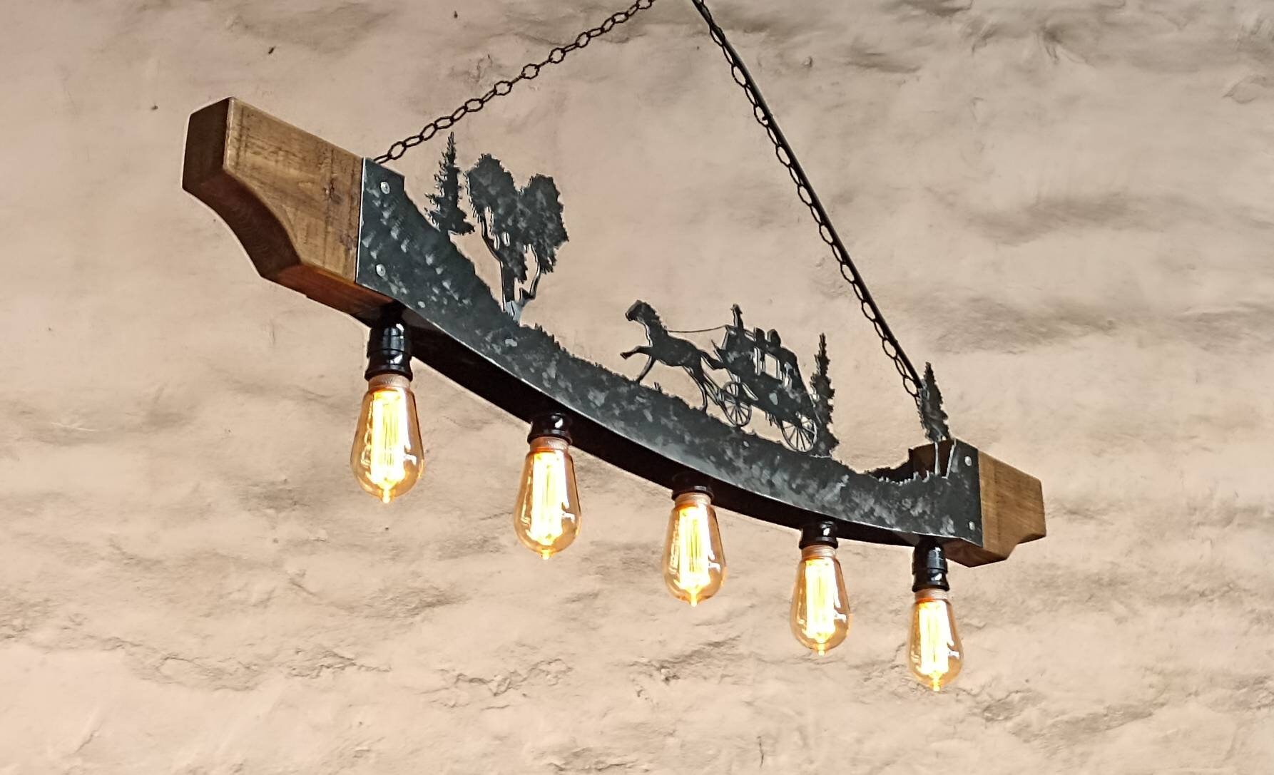 Western stagecoach farmhouse ceiling light illuminated