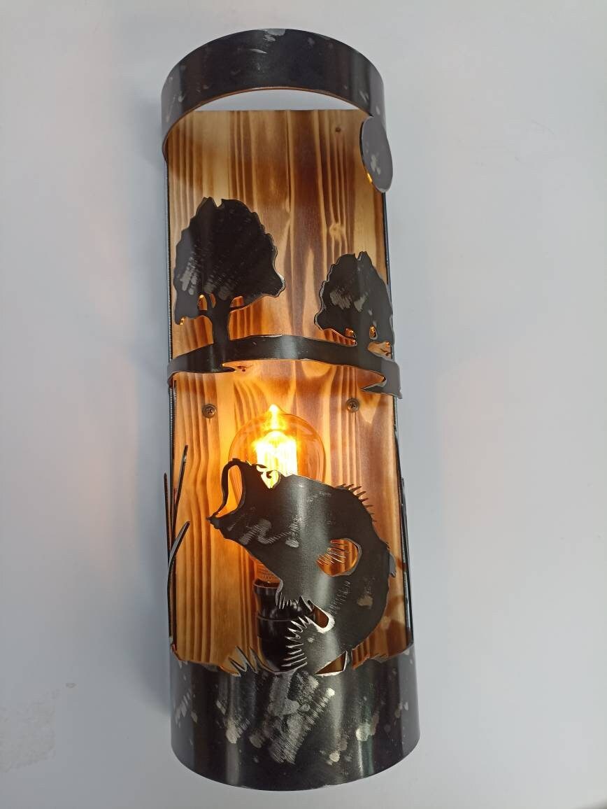 Bass fish lake house wall sconce steel and burnt wood